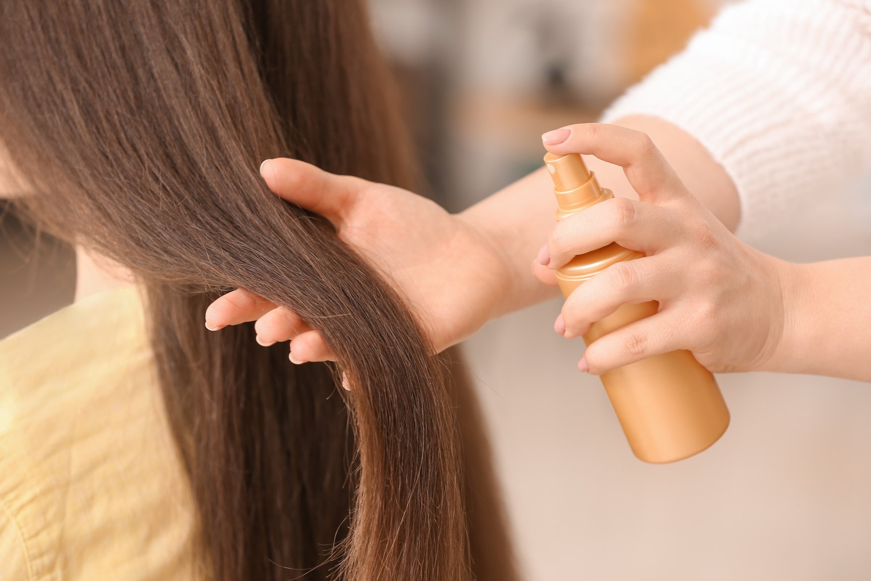 Hairdresser Styling Customer's Hair